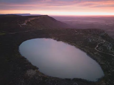 A vlei and dam on the edge of the escarpment seen from the air