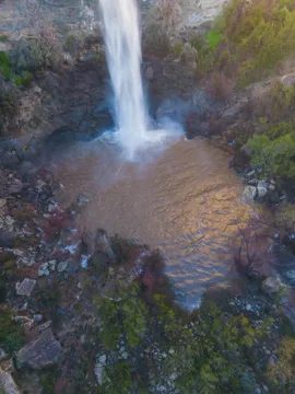 The waterfall and its pool seen from the air